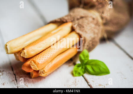 Le scorte di pane su sfondo di legno Foto Stock