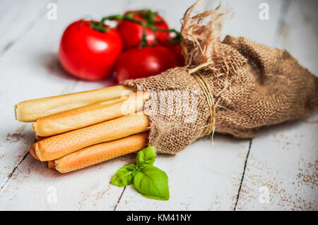 Le scorte di pane su sfondo di legno Foto Stock