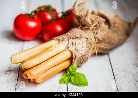 Le scorte di pane su sfondo di legno Foto Stock