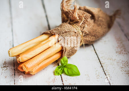 Le scorte di pane su sfondo di legno Foto Stock