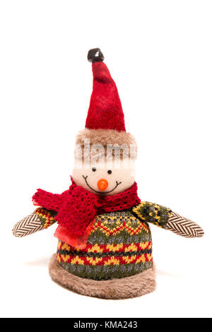 Pupazzo di neve ripiene toy isolato su uno sfondo bianco. Foto Stock