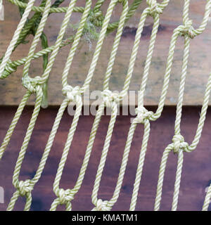 Abstract sfondo con una rete da pesca pronto per essere gettato in mare Foto Stock