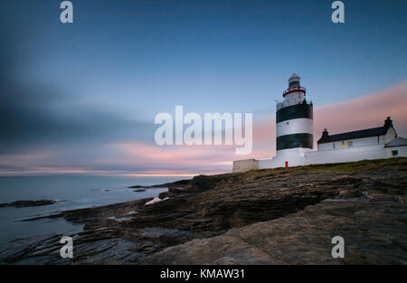 Faro di hook sulla testa a gancio penisola nella contea di Wexford, Irlanda. Foto Stock