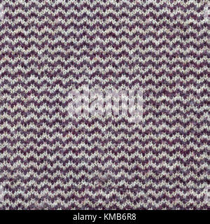Seamless texture di felpa lavorata a maglia. ripetendo angora tessuto a maglia texture. viola e beige modello di un maglione pesante Foto Stock