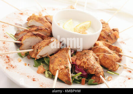 Straccetti di pollo tikka platter Foto Stock