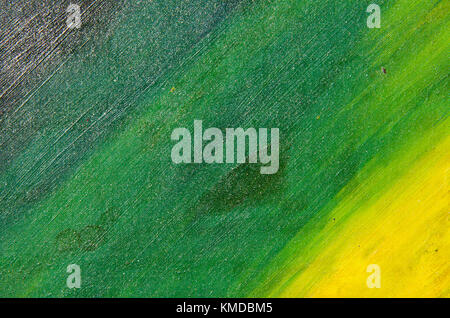 Colori gradiente dal nero al verde e giallo su tela Foto Stock