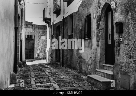 Disegni della pavimentazione delle strade della città di Erice sicilia Foto Stock