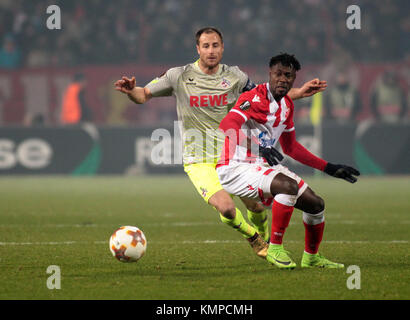 Belgrado, Serbia. 7 dicembre 2017. Matthias Lehmann di Colonia e Richmond Boakye di Belgrado in azione durante la partita di calcio del gruppo H dell'Europa League tra Red Star Belgrado e 1. FC Cologne a Belgrado, Serbia, 7 dicembre 2017. Crediti: Dragan Stankovic/dpa/Alamy Live News Foto Stock