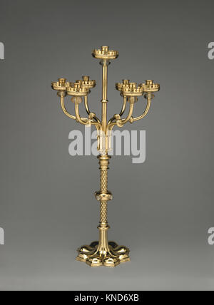 Candelabro incontrato DP-12252-029 658639 Designer: Augustus Welby Northmore Pugin, britannico, Londra 1812?1852 Ramsgate, Fabbricante: attribuita a Giovanni Hardman & Co., Britannici candelabro, ca. 1850, ottone e vetro, Altezza: 33 a. (83,8 cm). Il Metropolitan Museum of Art di New York. Acquisto, Barnard College dono, i fondi provenienti da diversi donatori, in onore di Danielle O. Kisluk-Grosheide, Marion E. Cohn e Susan Dwight Bliss doni, da exchange, Lesley e Emma Sheafer raccolta, il lascito di Emma A. Sheafer, da Exchange e i fondi provenienti da diversi donatori, da exchange, 2015 (2015.428) Foto Stock