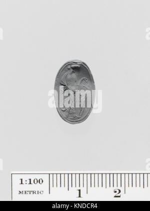 Questo scarabeo d'oro è un manufatto greco del IV secolo a.C., di 1,6 cm di lunghezza. Fa parte della collezione del Metropolitan Museum of Art. Foto Stock