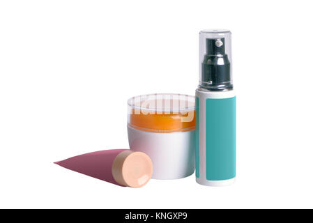 Tre multi-cosmetici colorati contenitori isolati su bianco Foto Stock