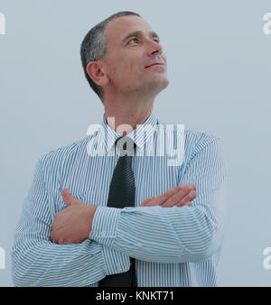 Ritratto di fiducioso imprenditore maturo con grappoli ripiegato in Foto Stock