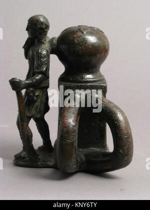 Dissuasore in bronzo con motivo pescatore, catalogo MET sf63-206s2, che rappresenta la scultura marinara tardoromana o bizantina dell'inizio del V secolo. Foto Stock