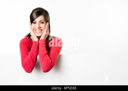 Presentatore femmina acronimo vuoto scheda bianca sorridente Excited donna Foto Stock