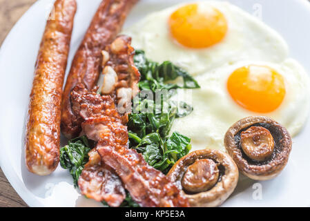 Uova fritte con pancetta Foto Stock