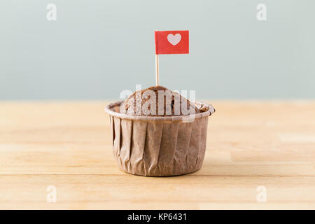 Bandiera su muffin con una forma di cuore Foto Stock