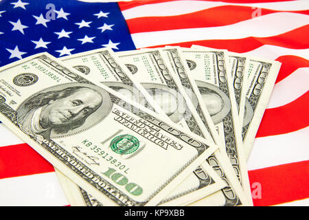 Dollari americani e bandiera. Foto Stock