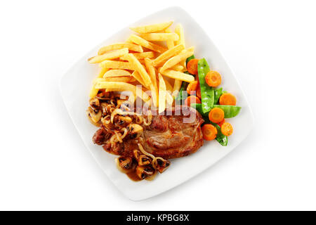 Lombo di maiale bistecca in alta vista angelo con funghi e salsa e saporite patate fritte Foto Stock
