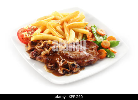 Carne di maiale iberico Lombata di manzo con salsa di funghi e verdure come un menu Foto Stock