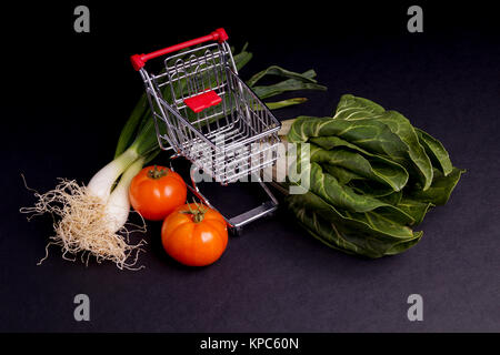 Carrello di trinciatura con verdura Foto Stock