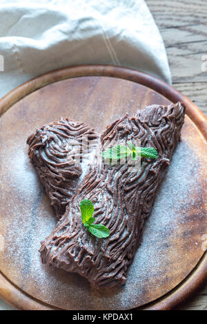 Yule log sul pannello di legno Foto Stock