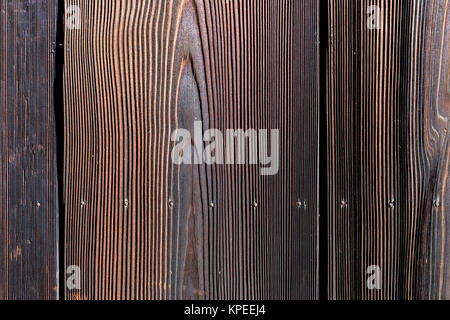 Scuro parete in legno Foto Stock