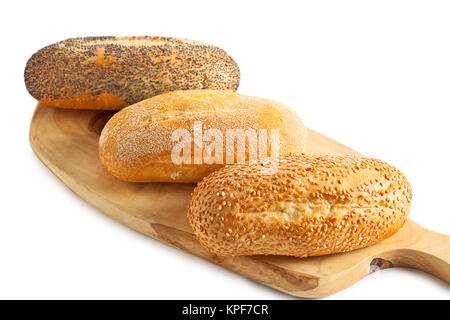 Tre tipi di pane sulla tavola in legno Foto Stock
