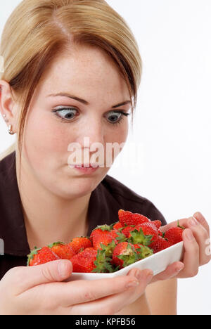 Junge Frau mit Erdbeeren - giovane donna con fragole Foto Stock