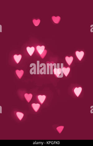 Sullo sfondo di un cuore bokeh di fondo sagomata Foto Stock