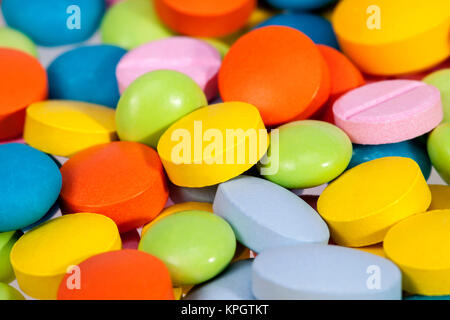 Sfondo colorato di pillole di medico Foto Stock