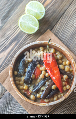 Melanzane e curry di ceci Foto Stock