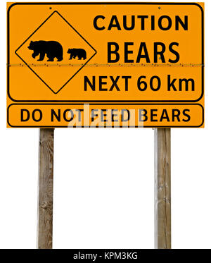 Attenzione porta avanti 10km - Non porta di alimentazione. Giallo lato strada in British Columbia, Canada. Foto Stock