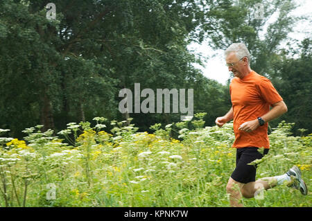 Esecuzione di uomo Senior Foto Stock