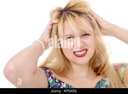 Frustrati bella donna bionda con le mani sul suo capo Foto Stock