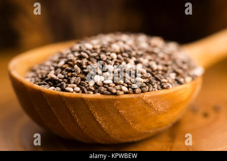 Semi di chia il cucchiaio di legno Foto Stock