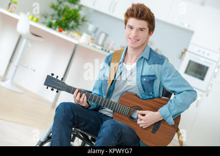 Chitarrista disabili Foto Stock