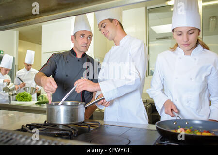 Chef di cucina consulenza studente Foto Stock