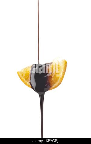 Fetta di arancia in sciroppo al cioccolato Foto Stock