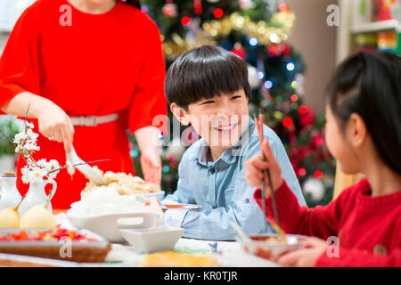 Cena di Natale giggles Foto Stock