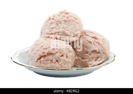 Palline di gelato alla fragola nella piastra Foto Stock