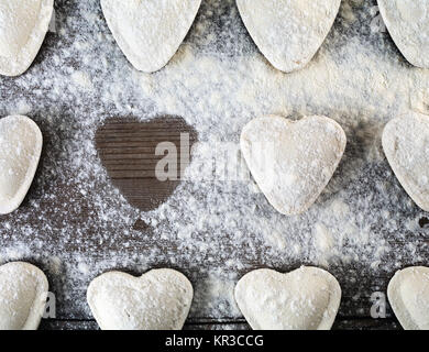 A forma di cuore ad gnocchi Foto Stock