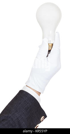 Mano nella business suit e guanto trattiene la luce della lampadina Foto Stock