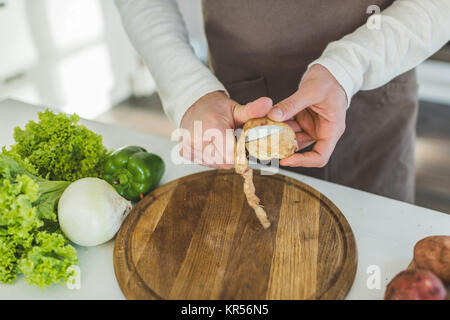 Uomo di patate per affettare Foto Stock