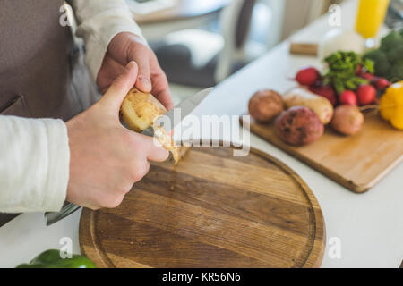 Uomo di patate per affettare Foto Stock