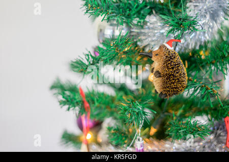 Stretta di mano azienda australiana decorazione di Natale nella parte anteriore dell albero di Natale Foto Stock