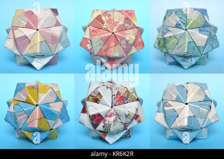 Modular origami, sonobe sfera, su sfondo blu Foto Stock