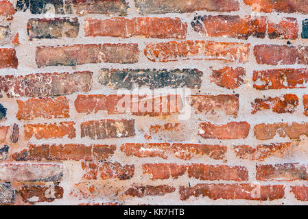 Sfondo di un vecchio rosso muro di mattoni Foto Stock