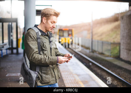 Prendendo il treno Foto Stock