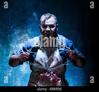 Bloody Halloween tema: crazy killer come macellaio Foto Stock