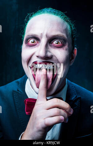 Bloody Halloween tema: crazy joker face Foto Stock